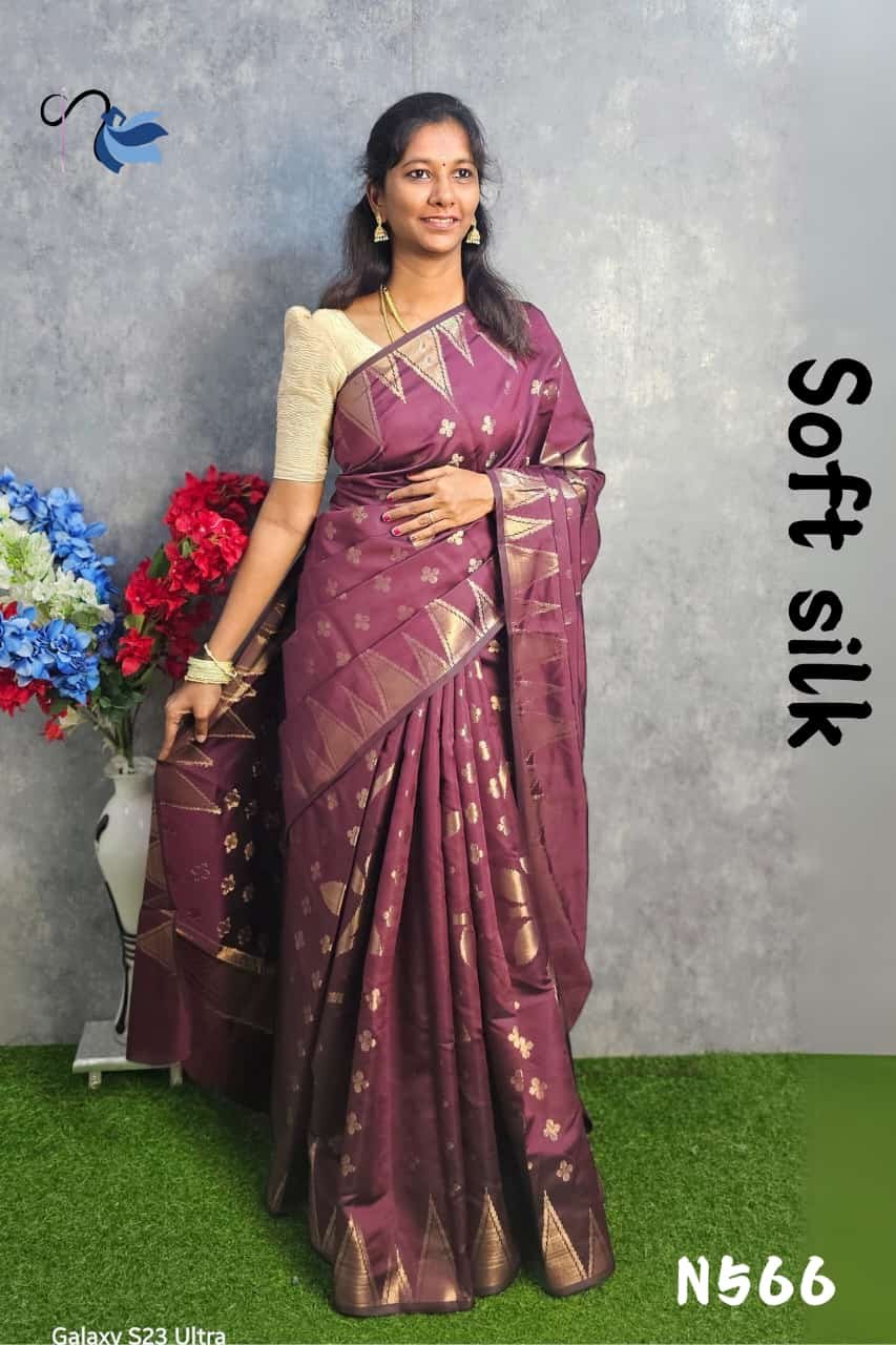 Indulge in the timeless beauty of a Banarasi soft silk saree.